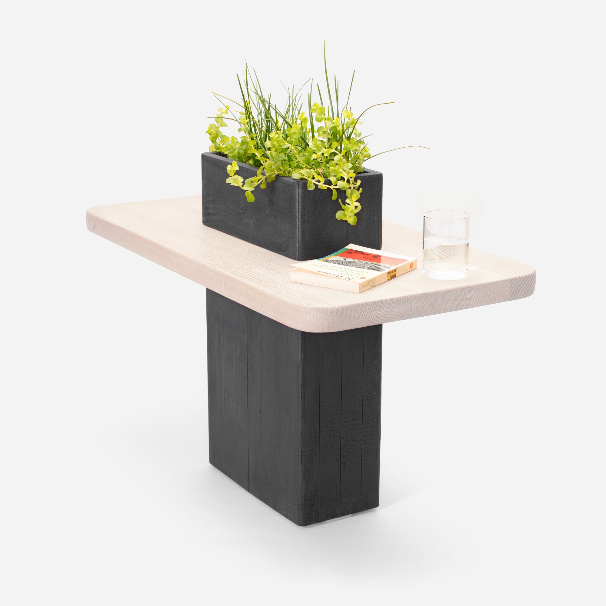 VegeTABLE side table featuring a glass vase and elegant wood design, perfect for plant lovers.