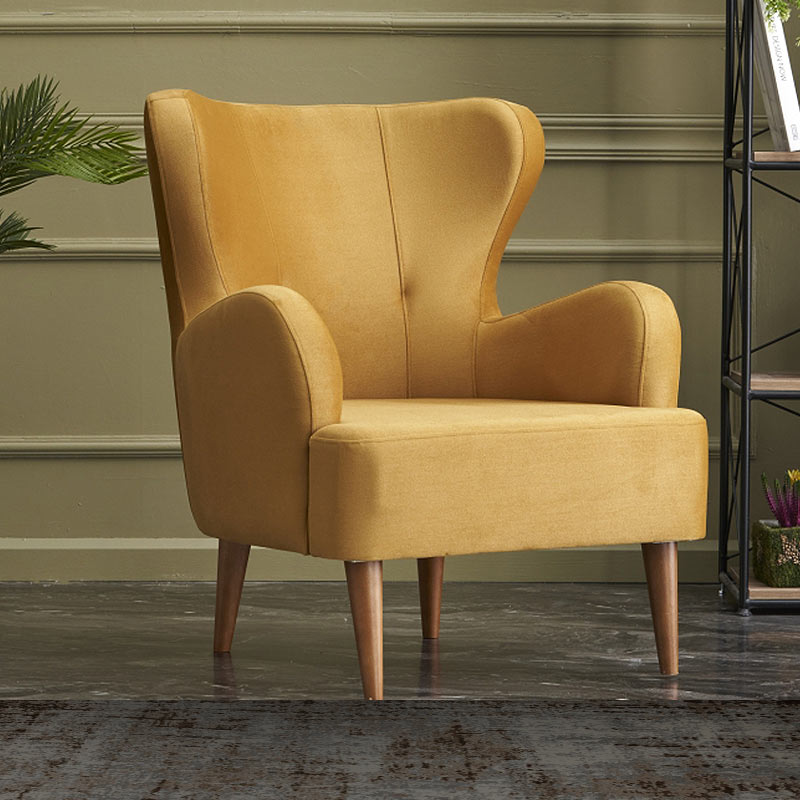 Luxurious Velvet Armchair KING in gold with plush upholstery and walnut wood legs, perfect for stylish interiors.