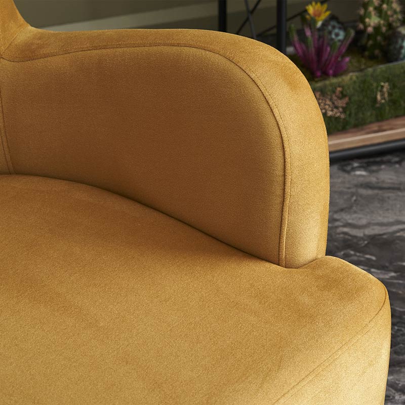 Luxurious Velvet Armchair KING in gold with plush upholstery and walnut wood legs, perfect for stylish interiors.