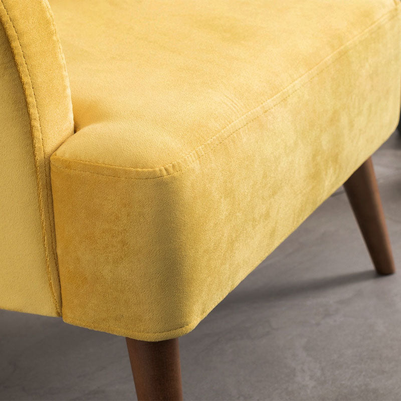 Velvet Armchair KING in vibrant yellow with plush upholstery and natural beech wood legs, measuring 69x60x88cm.