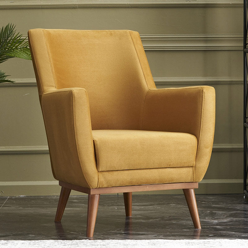 REGATA Velvet Armchair in mustard color with natural beech wood legs, showcasing its plush upholstery and elegant design.