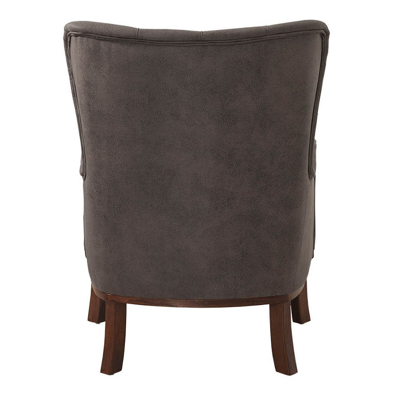 Velvet Armchair ROMEO in anthracite color, showcasing plush upholstery and natural wood legs.