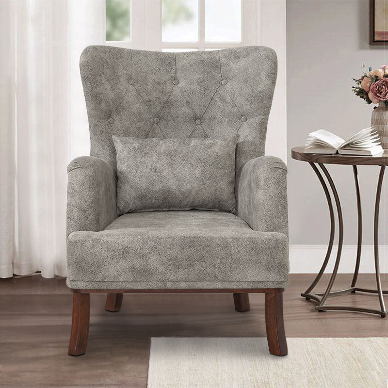 Velvet Armchair ROMEO in grey, featuring plush upholstery and natural wood legs, perfect for stylish relaxation.