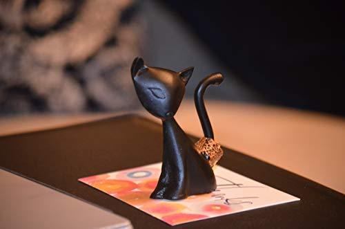 Vibhsa Cat Ring Holder in Black, featuring a charming cat design with a padded base for stability and protection of surfaces.