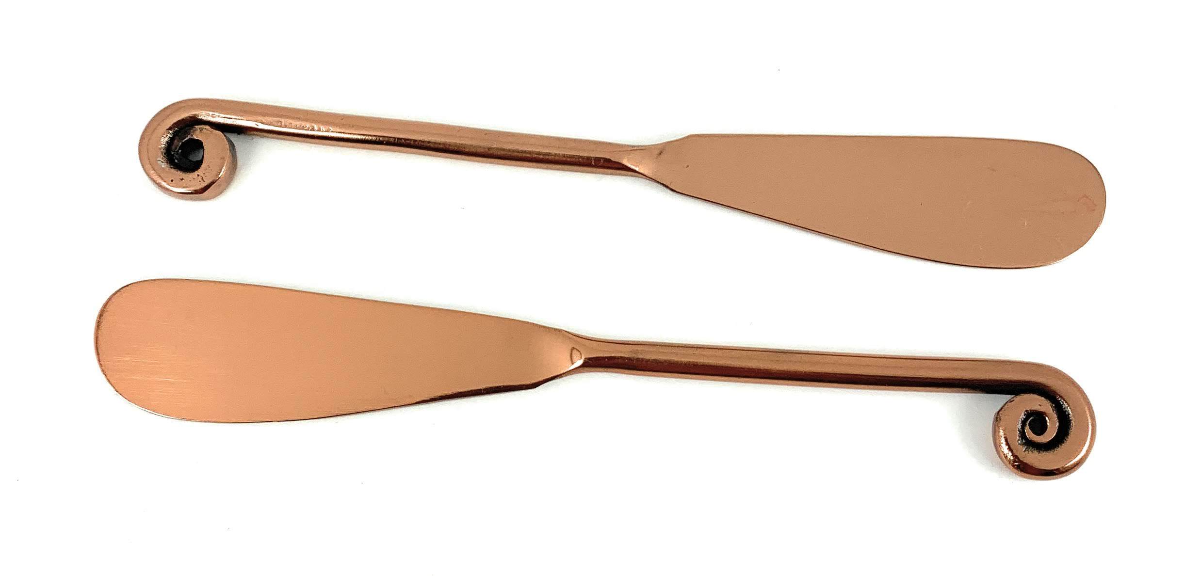 Set of 6 Vibhsa Copper Butter Spreaders with glossy finish, perfect for kitchen and dining decor.