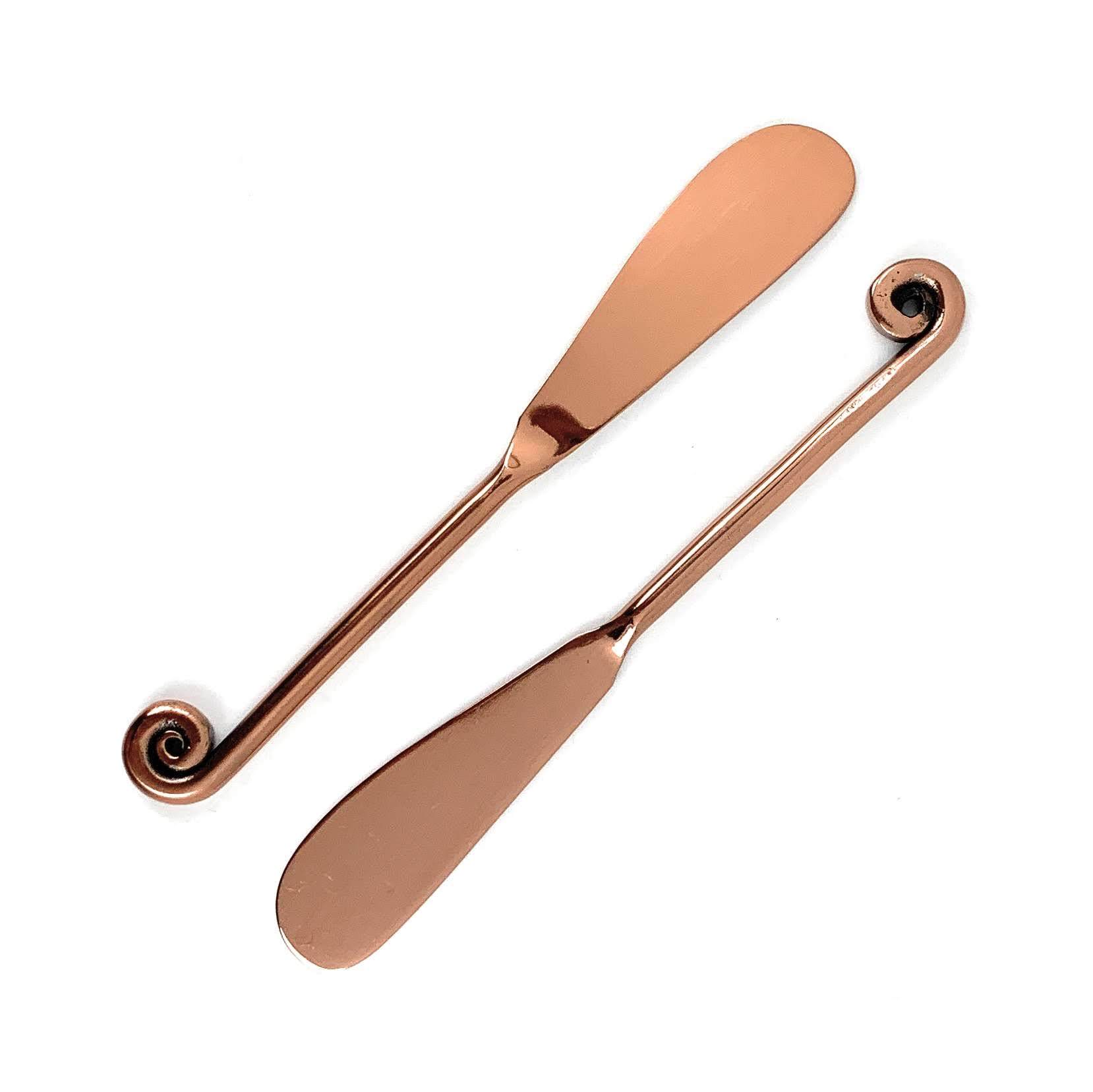 Set of 6 Vibhsa Copper Butter Spreaders with glossy finish, perfect for kitchen and dining decor.