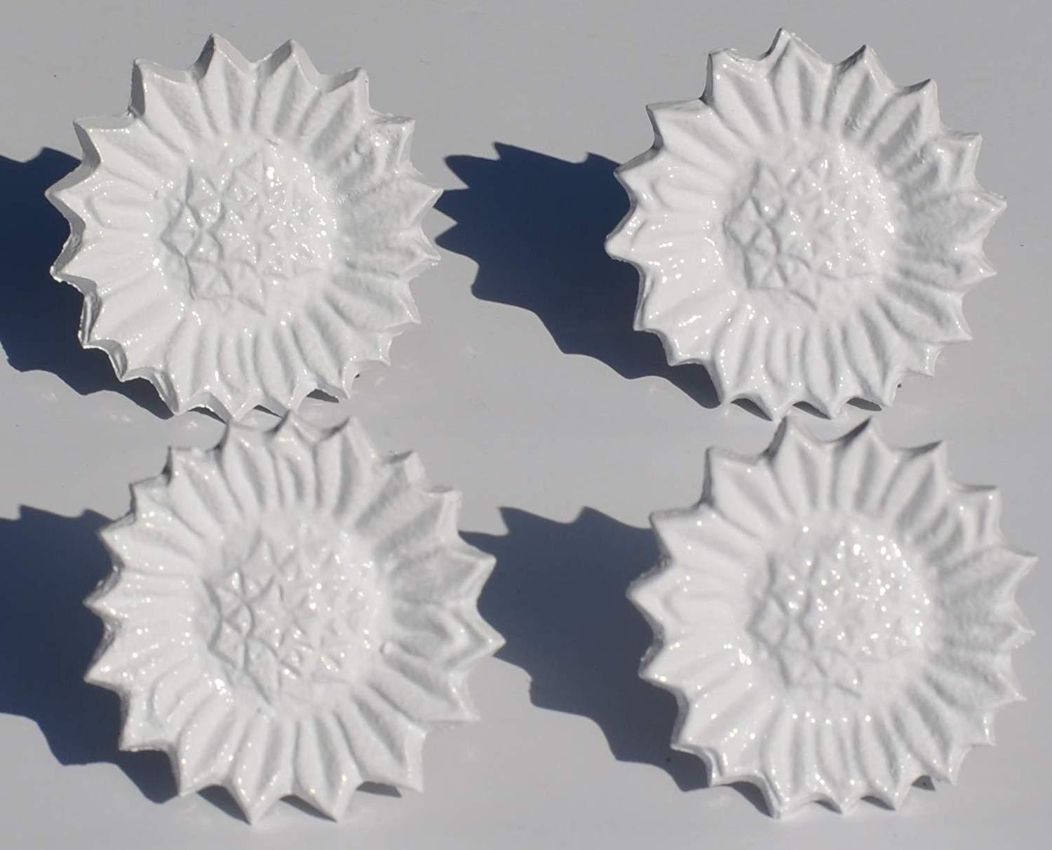 Set of 4 handcrafted white aluminum sunflower napkin rings, elegantly designed for dining decor.