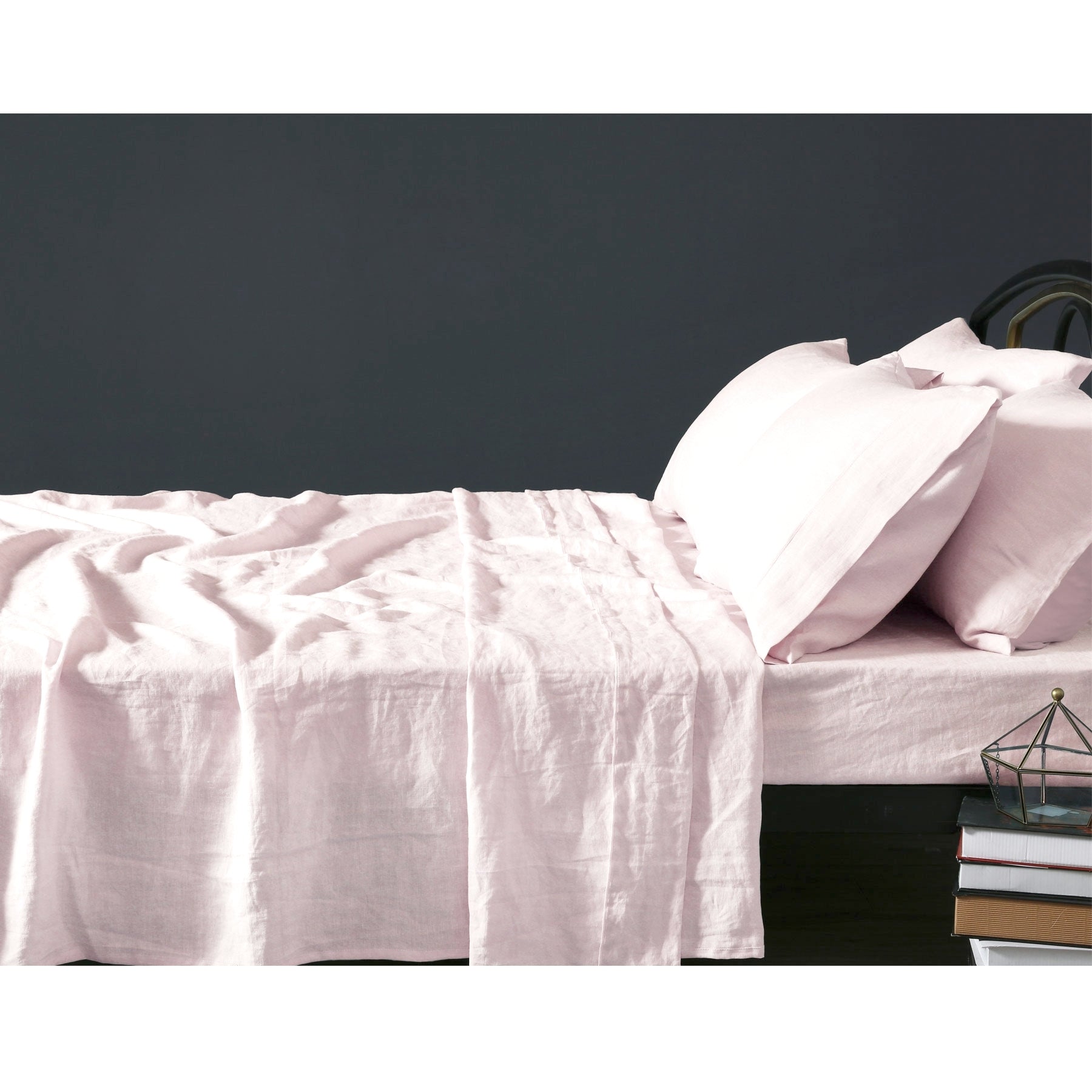 Vintage Design Homewares 100% Linen Blush Sheet Set displayed on a bed, showcasing its elegant blush color and soft texture.