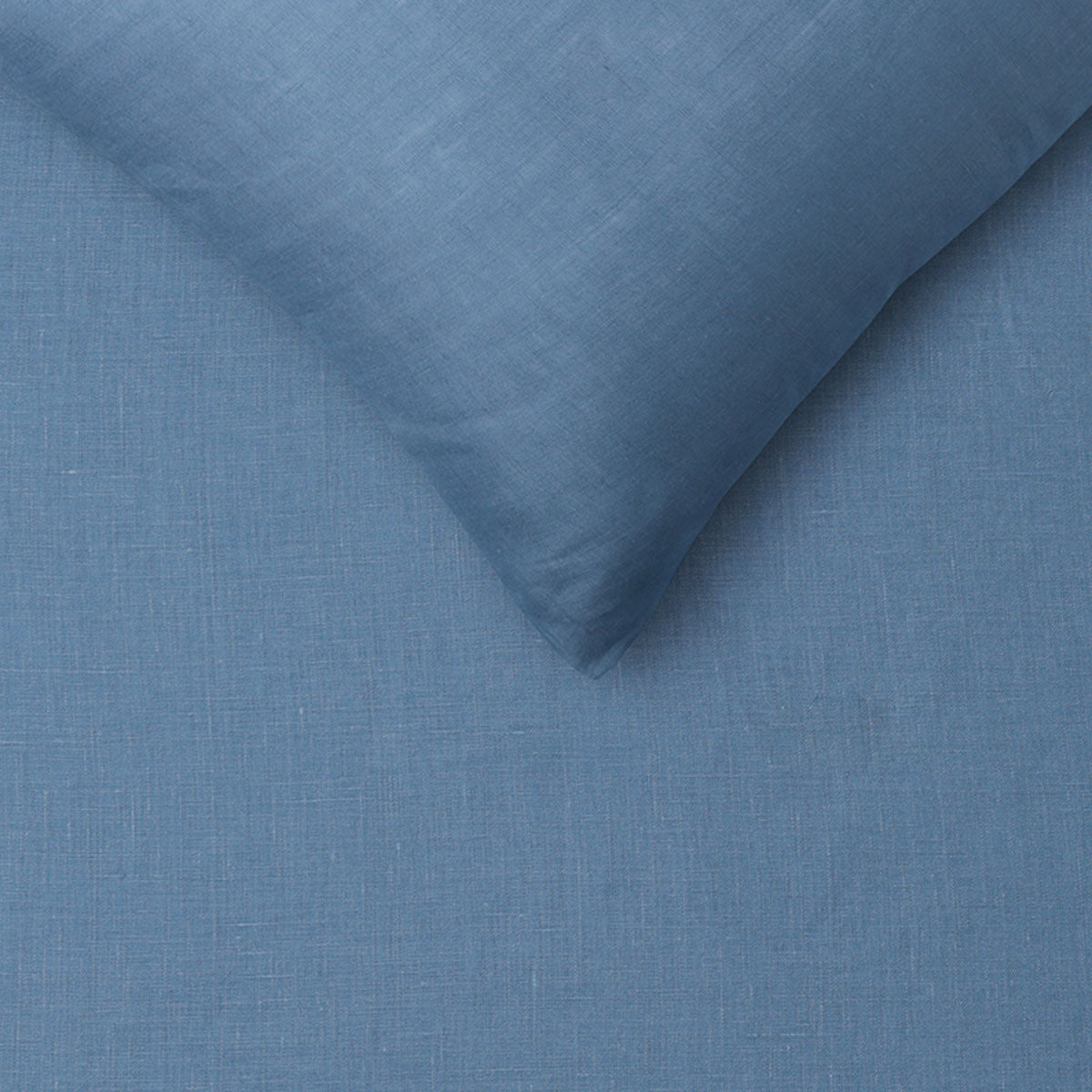 Vintage Design Homewares 100% Linen Brilliant Blue Sheet Set King displayed on a neatly made bed, showcasing its vibrant color and luxurious texture.