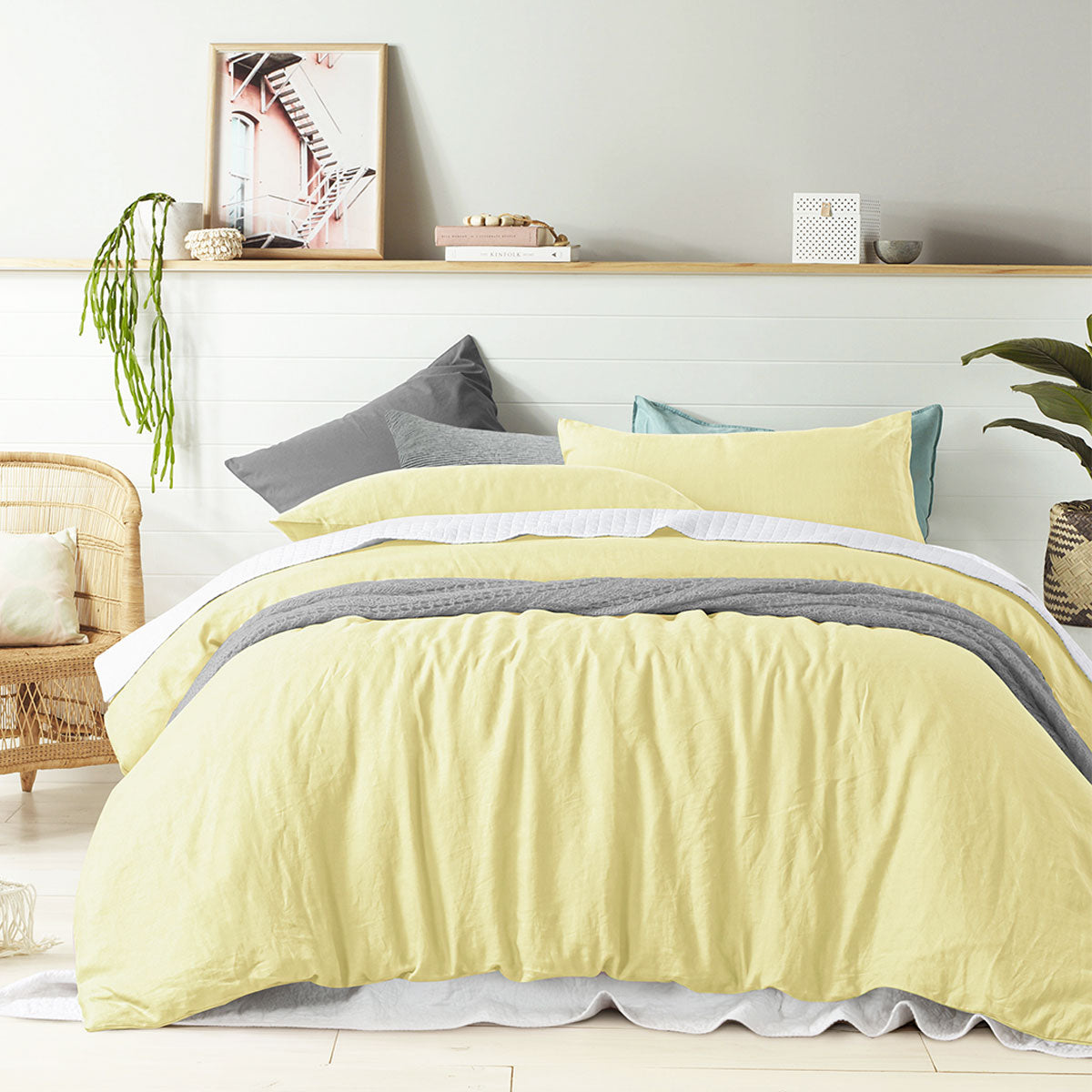 Vintage Design Homewares 100% Linen Butter Quilt Cover Set displayed on a queen-sized bed, showcasing its soft texture and elegant color.