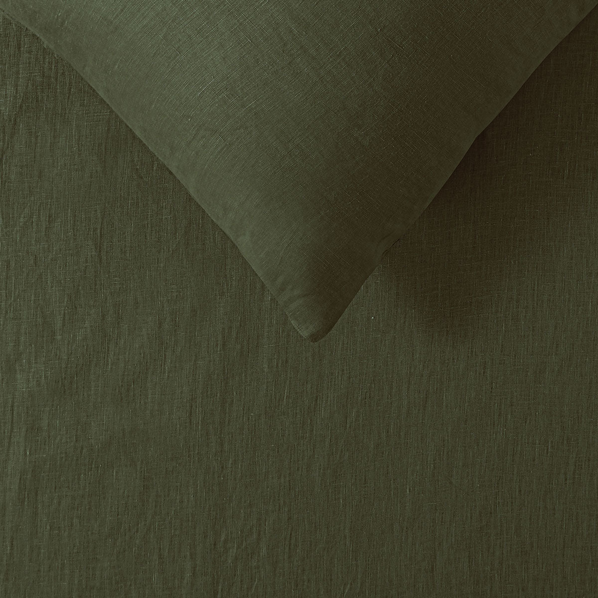 Vintage Design Homewares 100% Linen Olive Sheet Set displayed on a bed, showcasing its soft texture and elegant olive color.