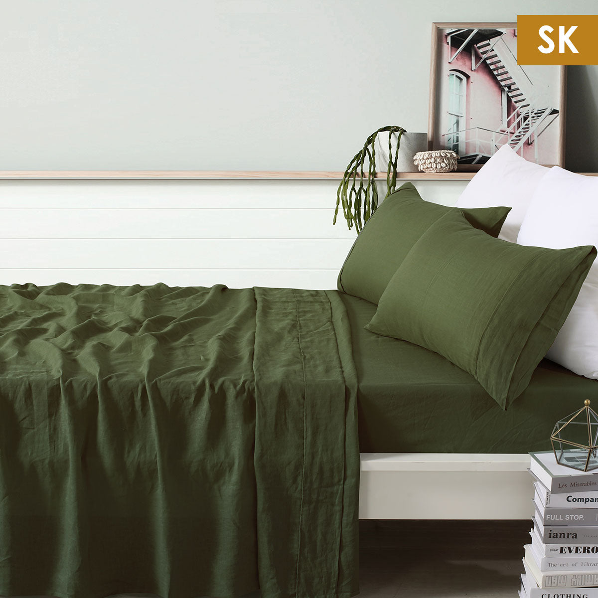 Vintage Design Homewares 100% Linen Olive Sheet Set displayed on a bed, showcasing its soft texture and minimalist olive color.