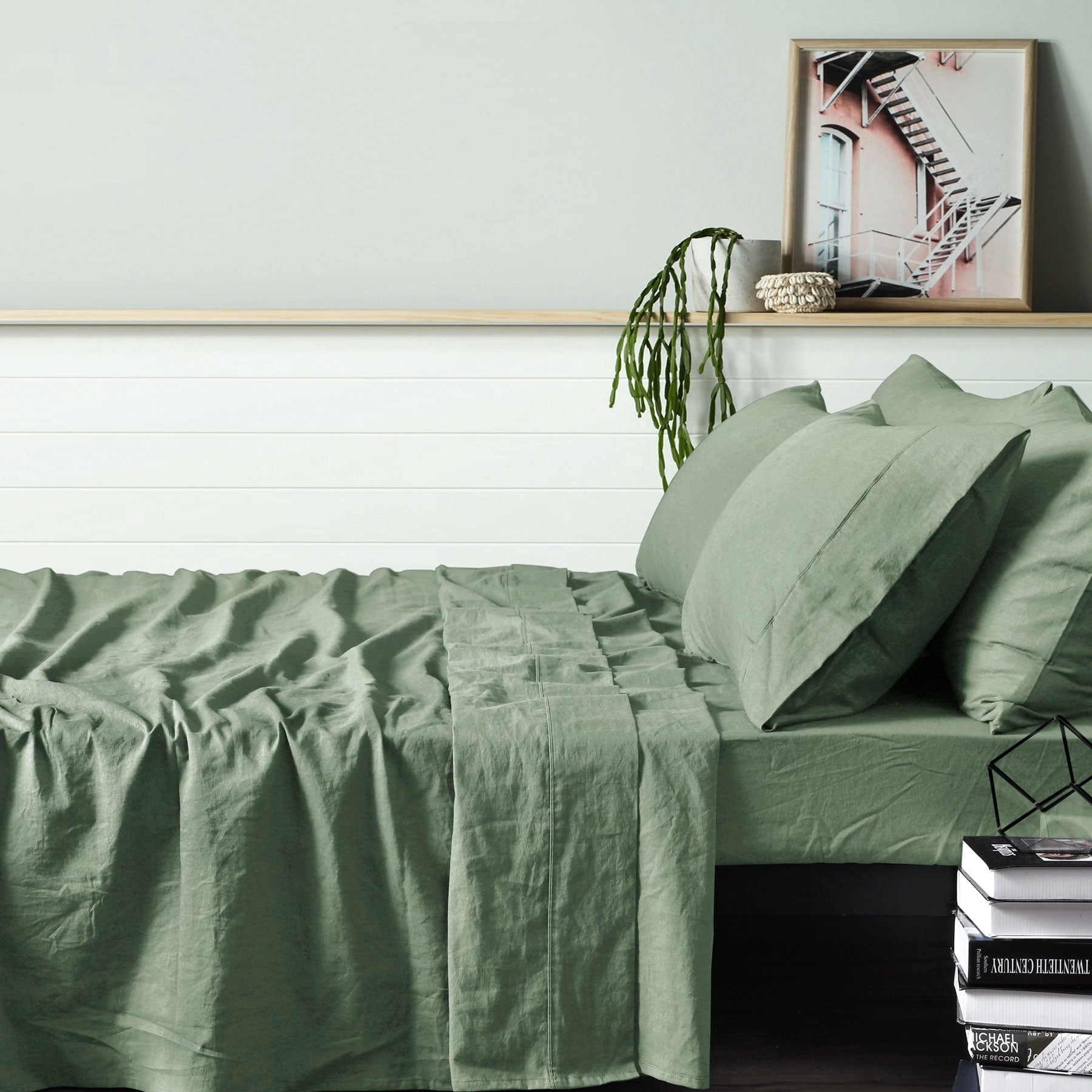 Vintage Design Homewares 100% Linen Sage Sheet Set KING displayed elegantly on a bed, showcasing its soft texture and soothing color.