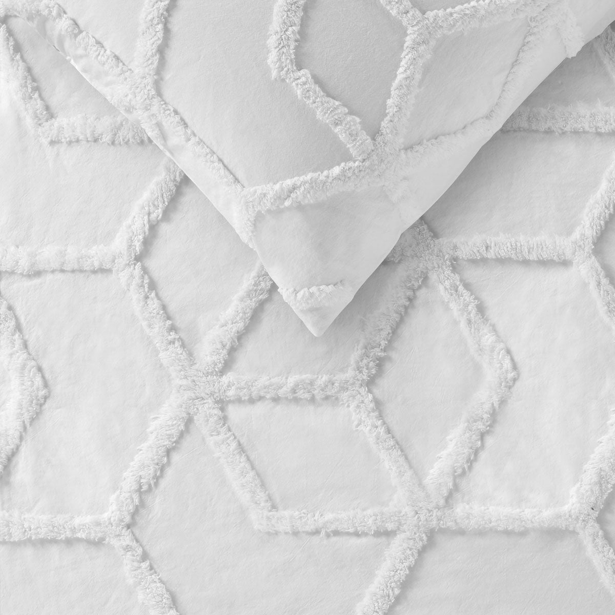 Dreamweaver White Cotton Quilt Cover Set featuring a chic chenille hexagon design, perfect for a stylish bedroom makeover.