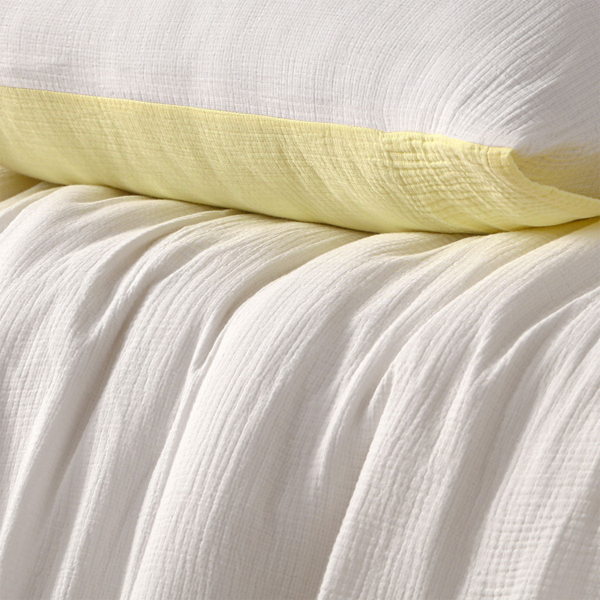 Hugo Reversible White Butter Cotton Gauze Quilt Cover Set featuring soft hues and a classic design, perfect for modern bedrooms.