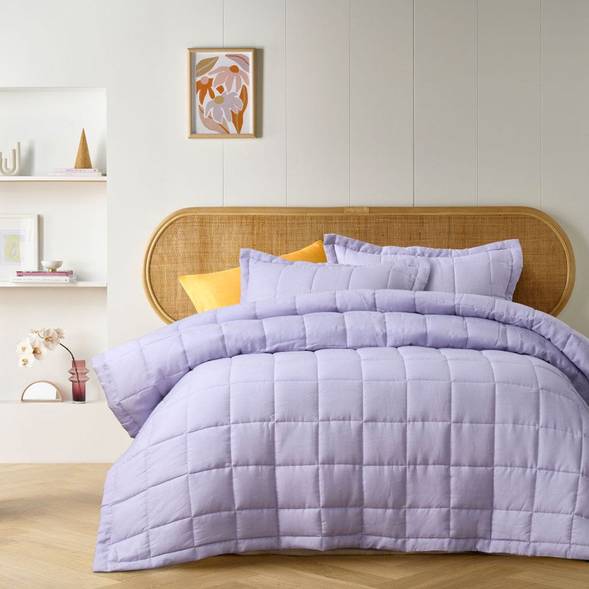 Vintage Design Homewares Lilac French Linen Coverlet Set displayed on a king-sized bed, featuring quilted squares design and soft lilac color.