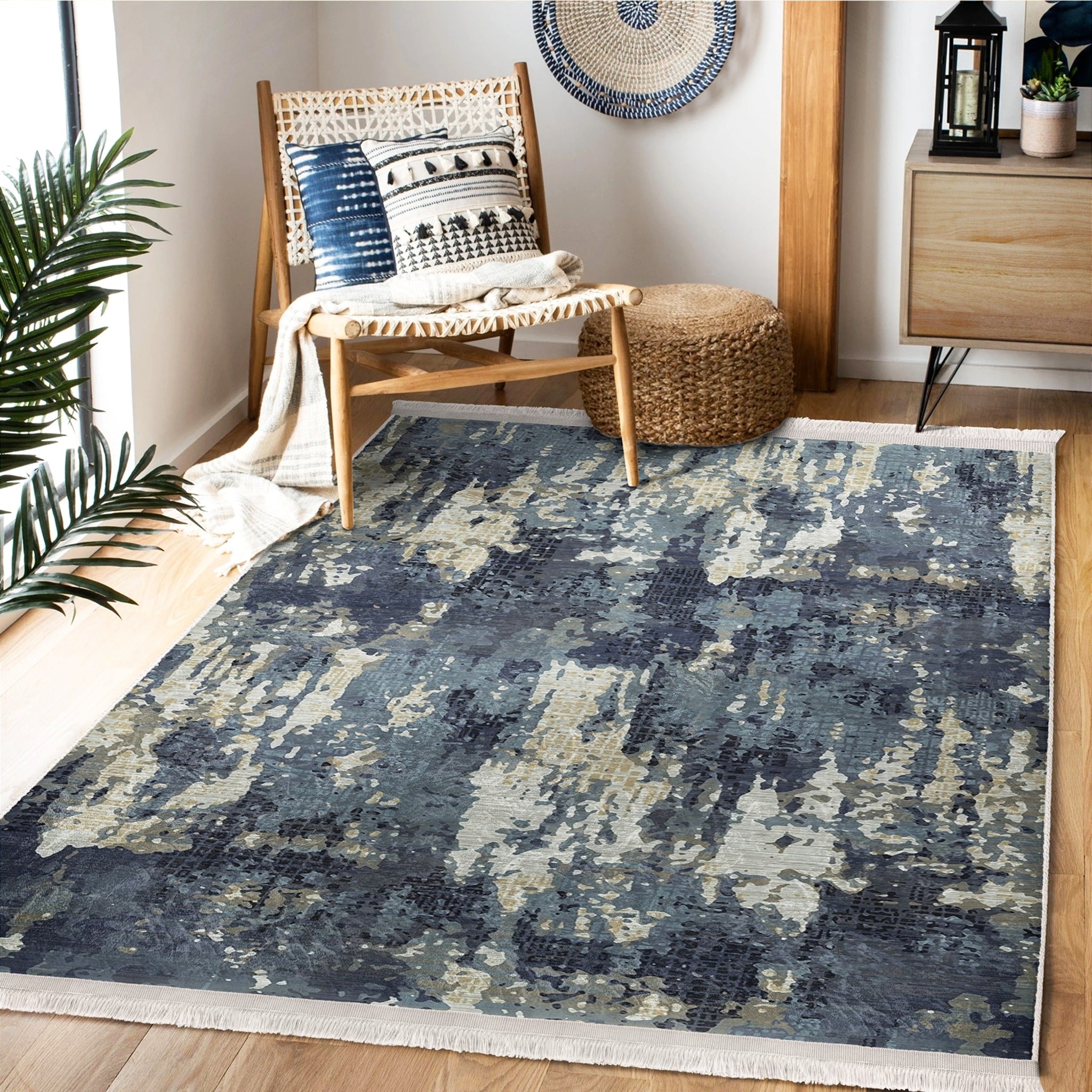 A vintage style washable area rug featuring elegant patterns and fringes, perfect for home decor.