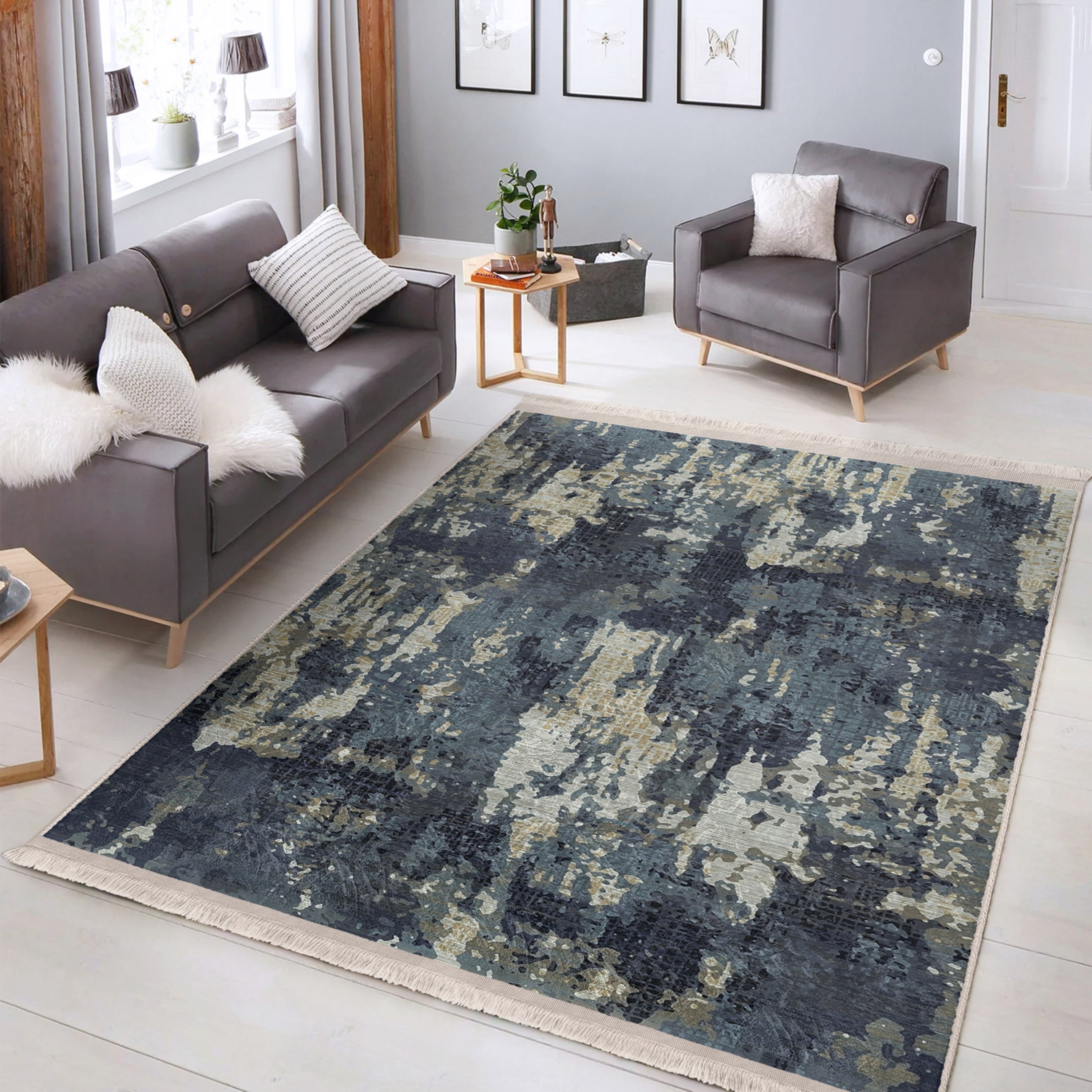 A vintage style washable area rug featuring elegant patterns and fringes, perfect for home decor.