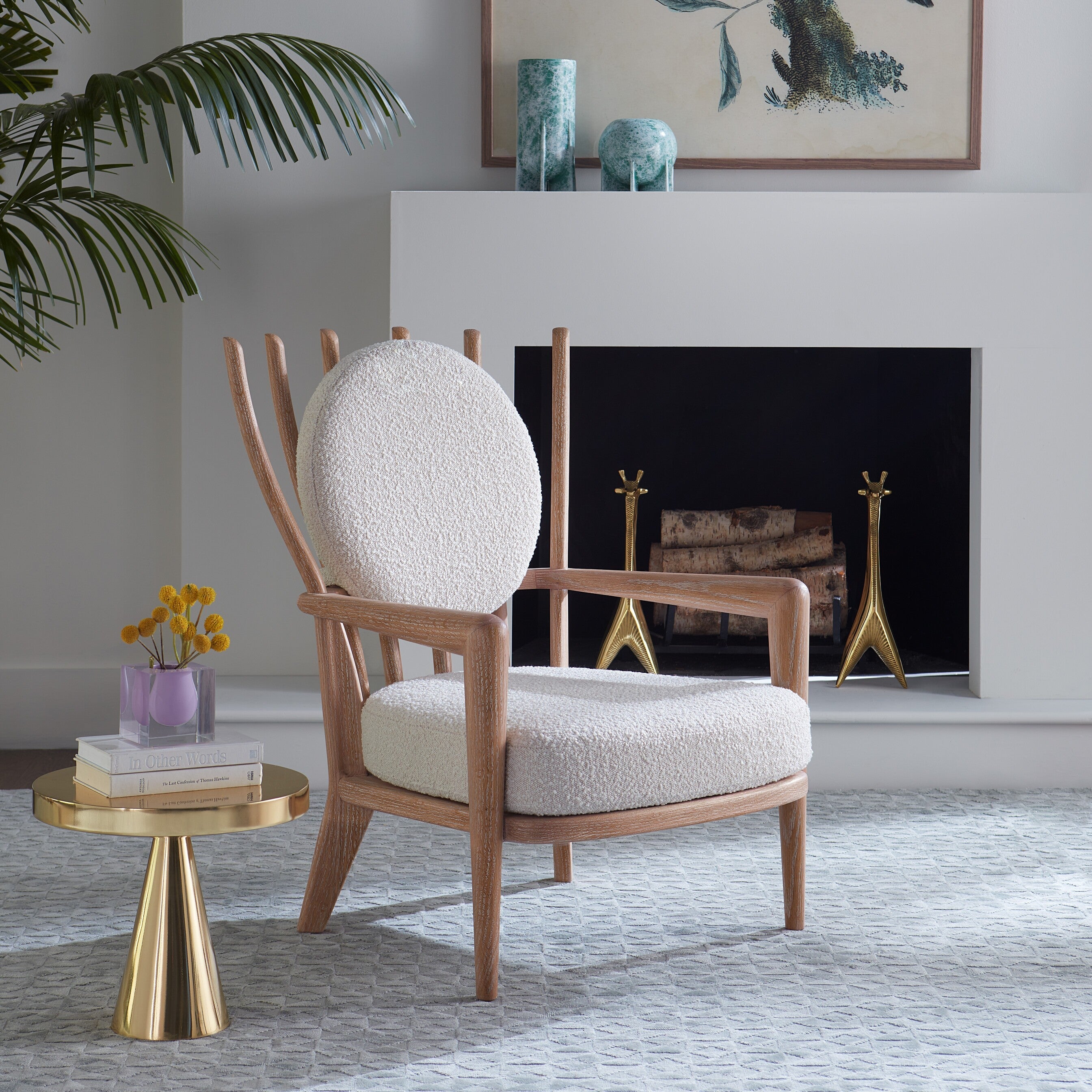 Voltaire Lounge Chair featuring a solid turned oak frame and oatmeal bouclé upholstery, showcasing a stylish and comfortable design.