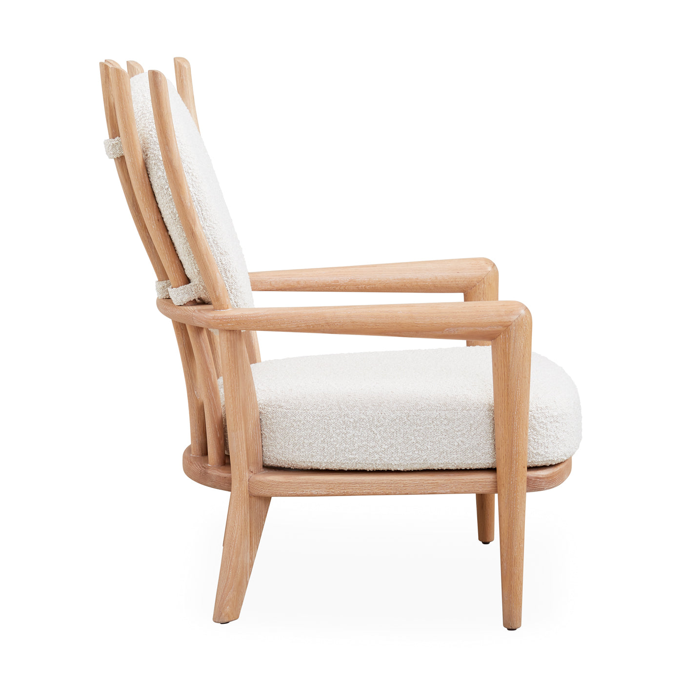 Voltaire Lounge Chair featuring a solid turned oak frame and oatmeal bouclé upholstery, showcasing a stylish and comfortable design.