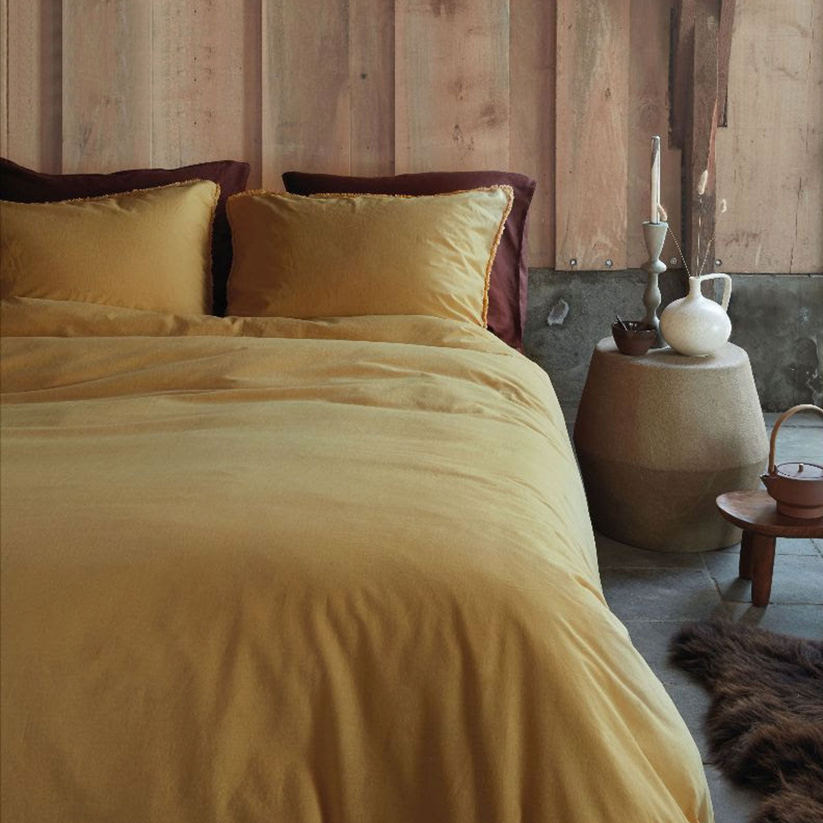 VTWonen Natural Stone Fraying Yellow Quilt Cover Set featuring a soft yellow quilt cover and matching pillowcases, perfect for elegant bedroom decor.