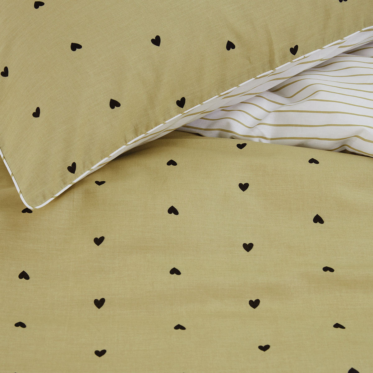 VTWonen Striped Hearts Yellow Cotton Quilt Cover Set featuring reversible heart and striped designs, made from soft percale cotton.