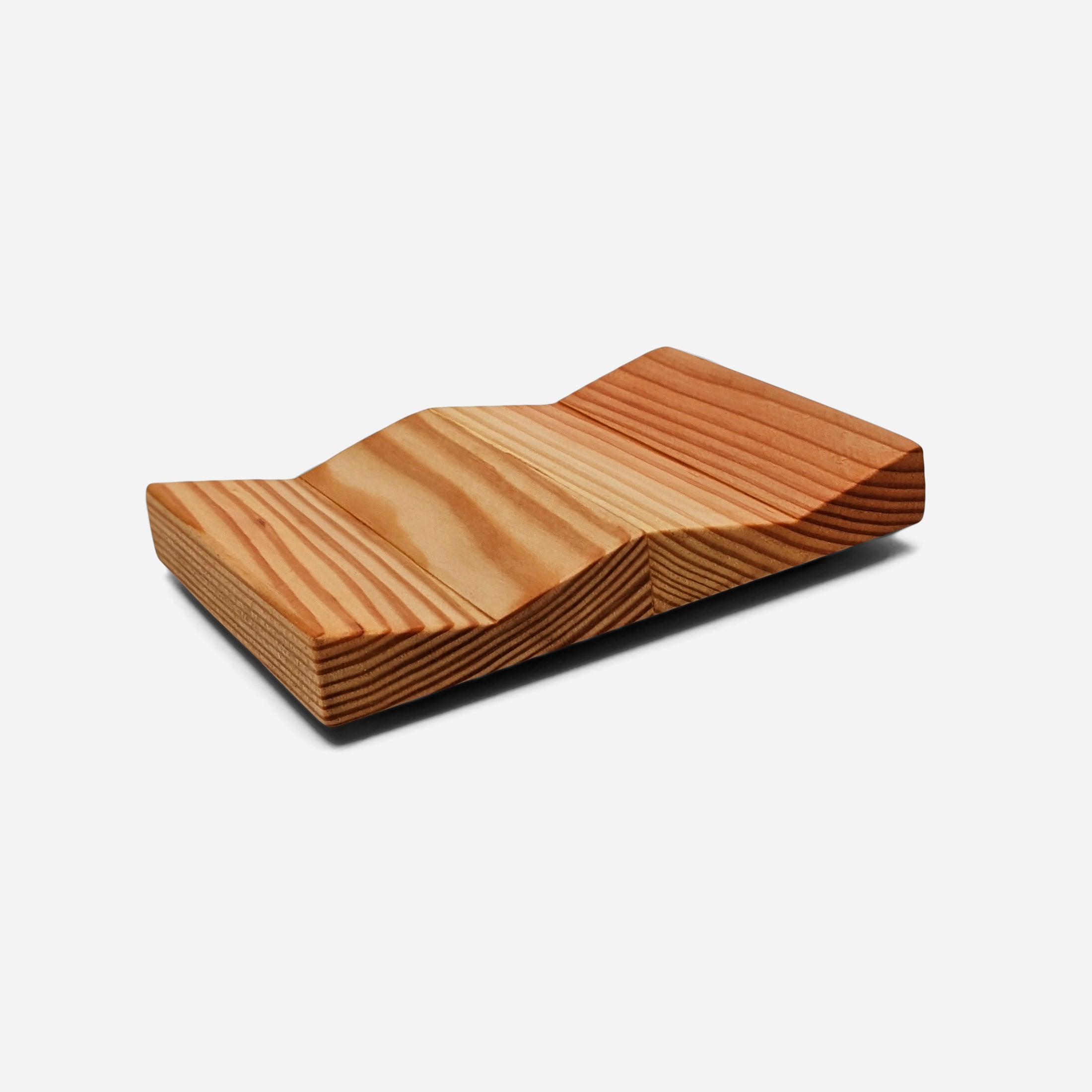 W Spoon Rest made of Doug Fir wood with beeswax finish, featuring two spaces for utensils.