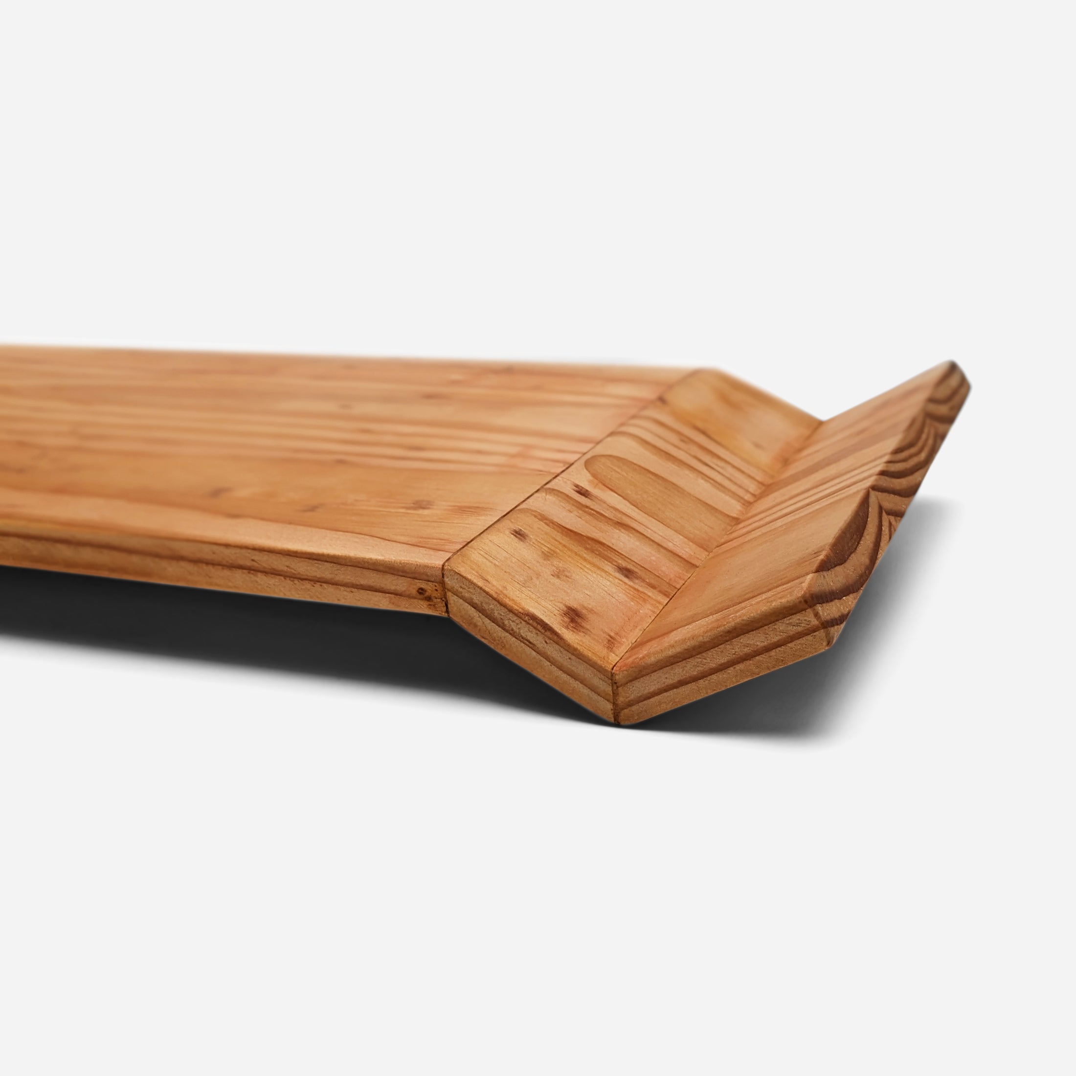 W Tray made of Doug Fir wood with beeswax finish, elegantly designed for serving food.