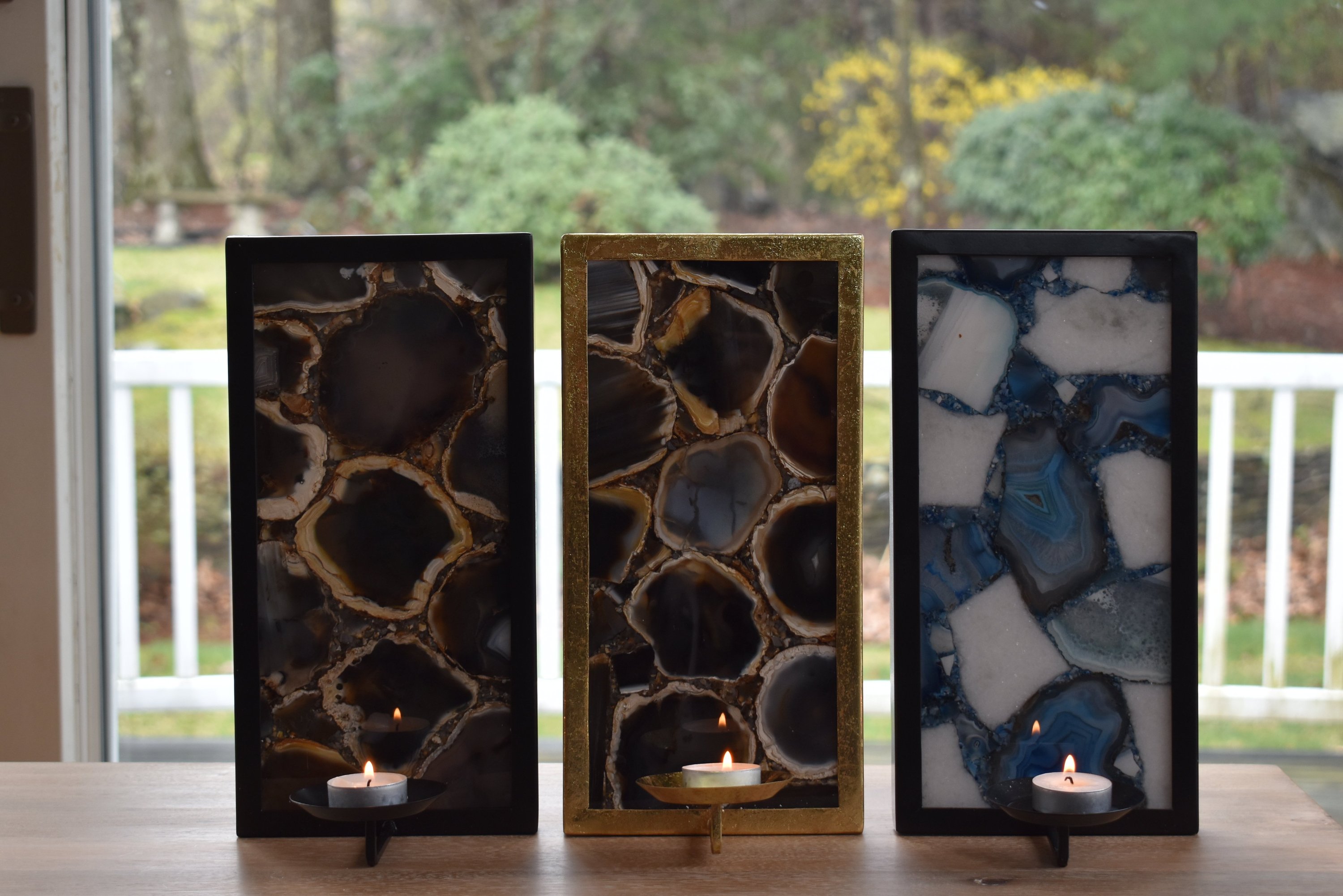 Wall Sconce Candle Holder featuring framed sliced agate with a tea light candle holder.