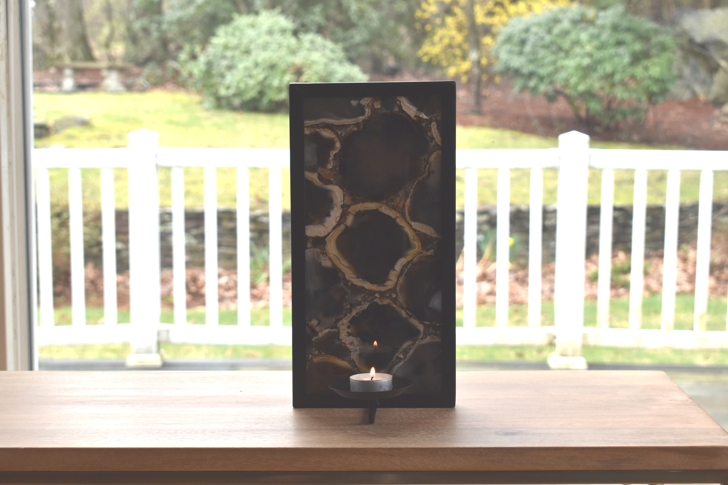 Wall Sconce Candle Holder featuring framed sliced agate with a tea light candle holder.