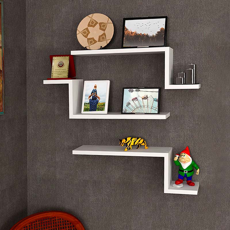 Set of three white wall shelves, each measuring 57.7x14.5x18 cm, made of durable melamine for stylish storage and display.