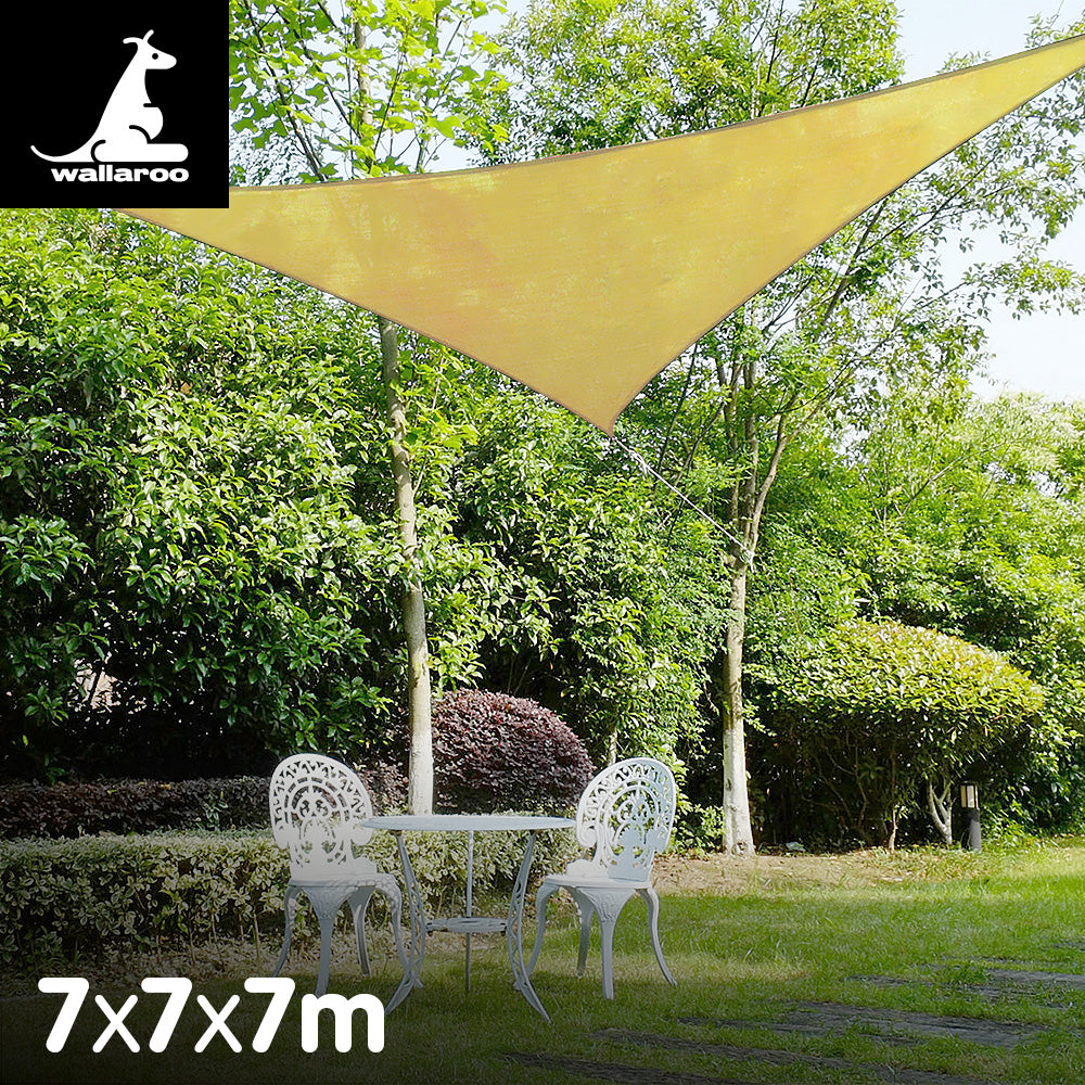 Wallaroo Triangle Shade Sail 7x7x7 in Sand, providing shade and comfort for outdoor spaces.