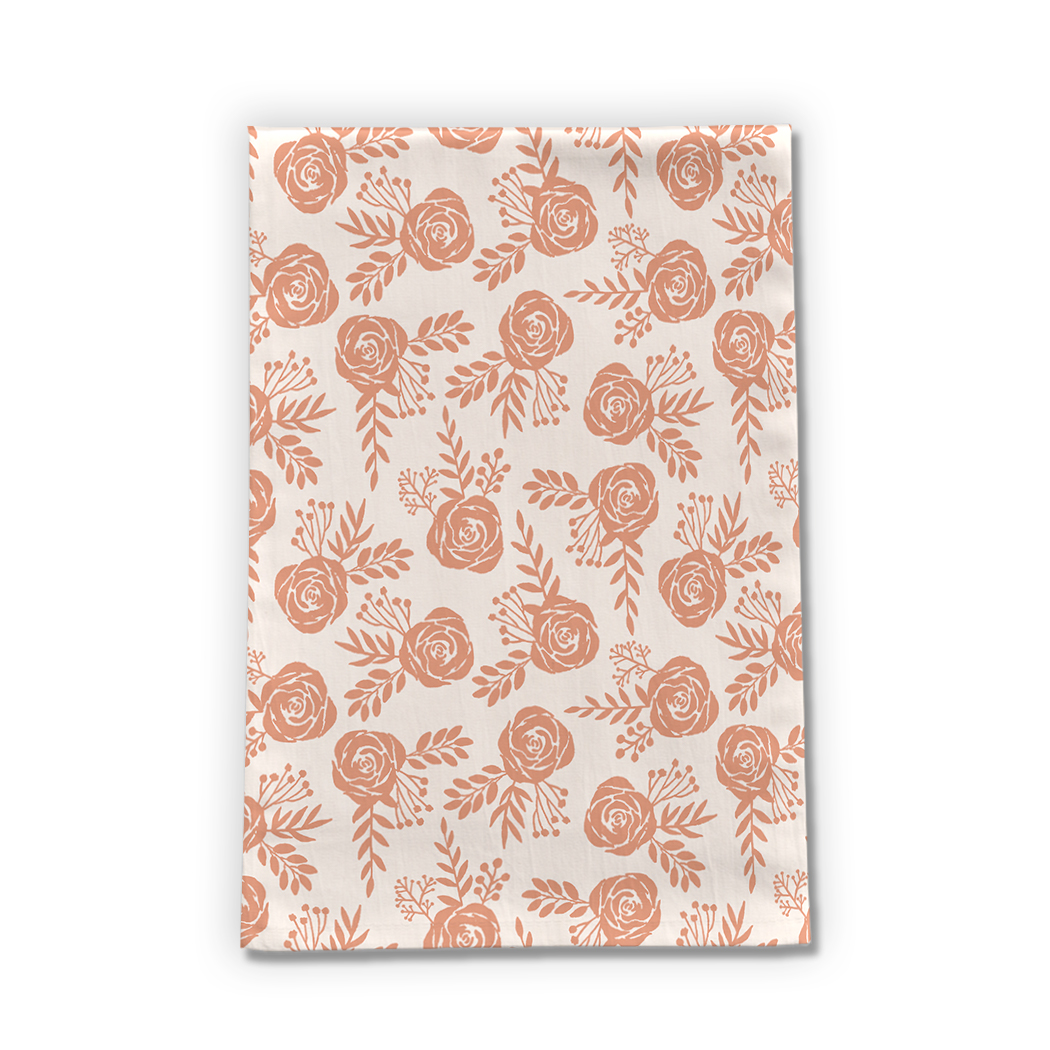 Warm orange floral tea towel made of cotton twill, featuring a vibrant floral design and hemmed edges, perfect for kitchen use.