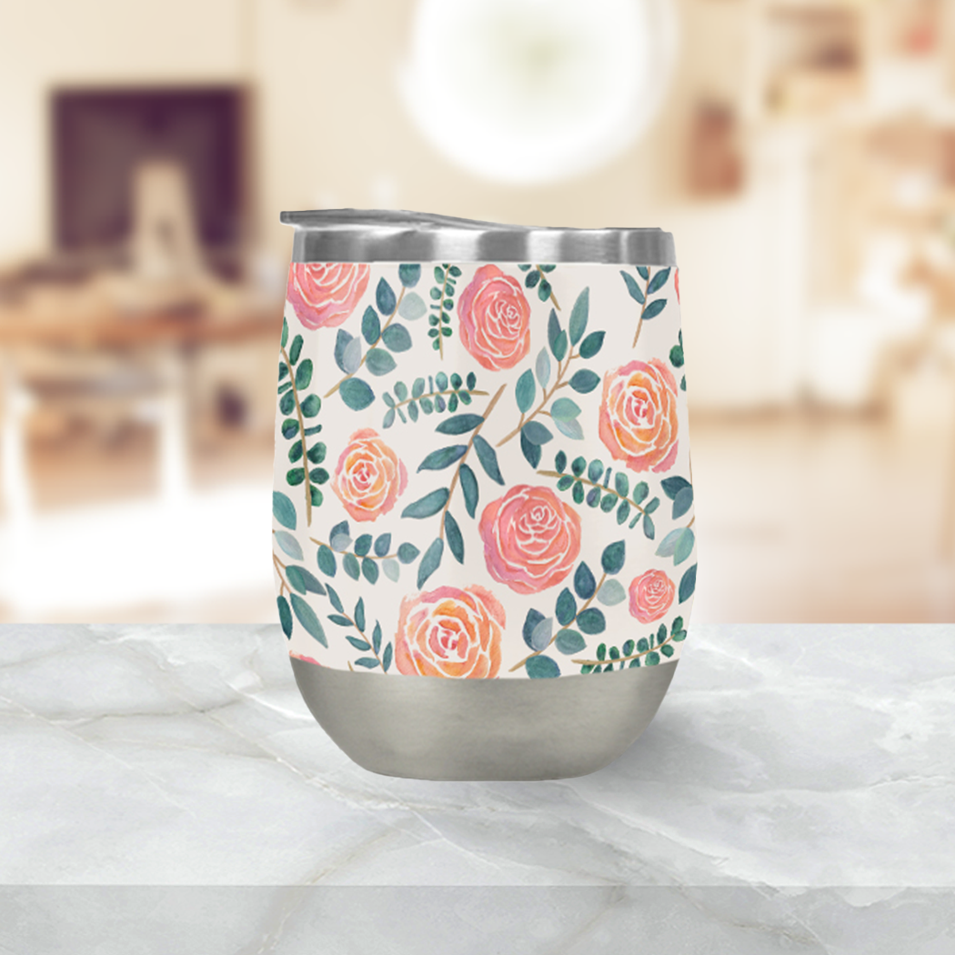 A stylish Watercolor Floral Wine Tumbler featuring a vibrant floral design, made of stainless steel with a plastic lid.