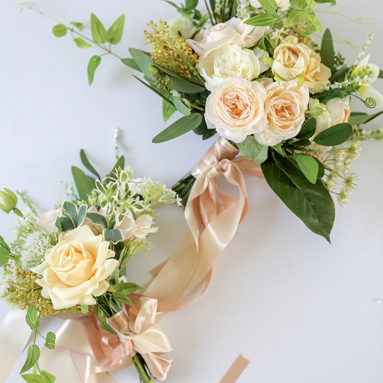 Artificial Wedding Bouquet with Champagne Roses, White Daisies, and Greenery Leaves, beautifully arranged for bridal use.