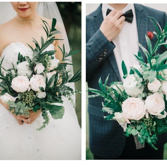 A beautiful pink and white artificial bridal bouquet, featuring roses and greenery, standing 19.7 inches tall, perfect for weddings.