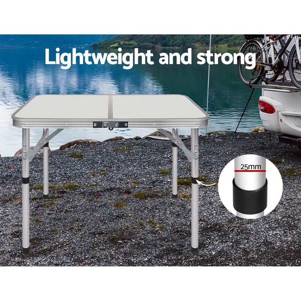 Weisshorn Foldable Kitchen Camping Table with adjustable height and strong aluminum frame, perfect for outdoor and indoor use.