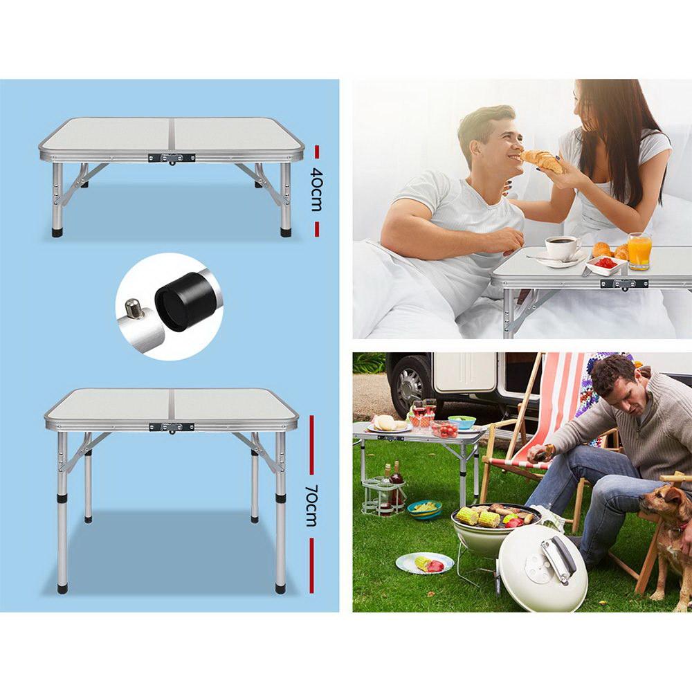 Weisshorn Foldable Kitchen Camping Table with adjustable height and strong aluminum frame, perfect for outdoor and indoor use.