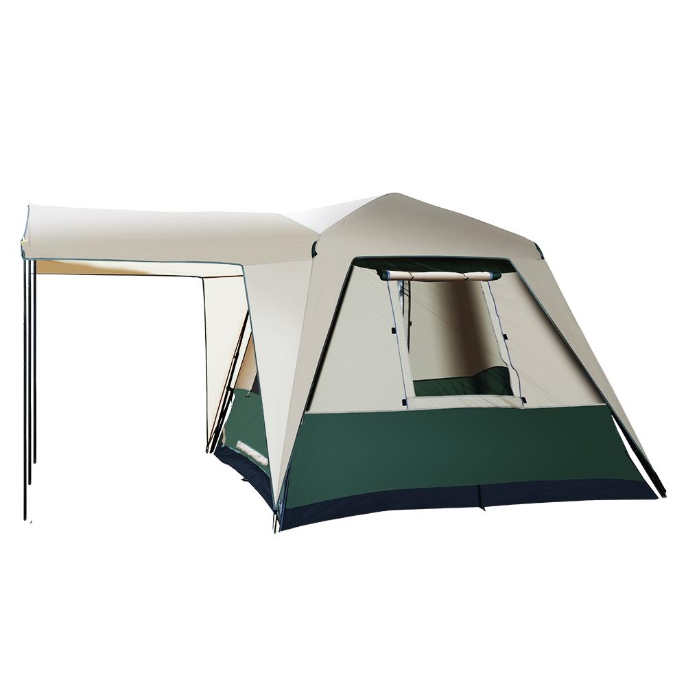 Weisshorn Instant Up Camping Tent set up in a natural outdoor setting, showcasing its spacious interior and mesh windows.