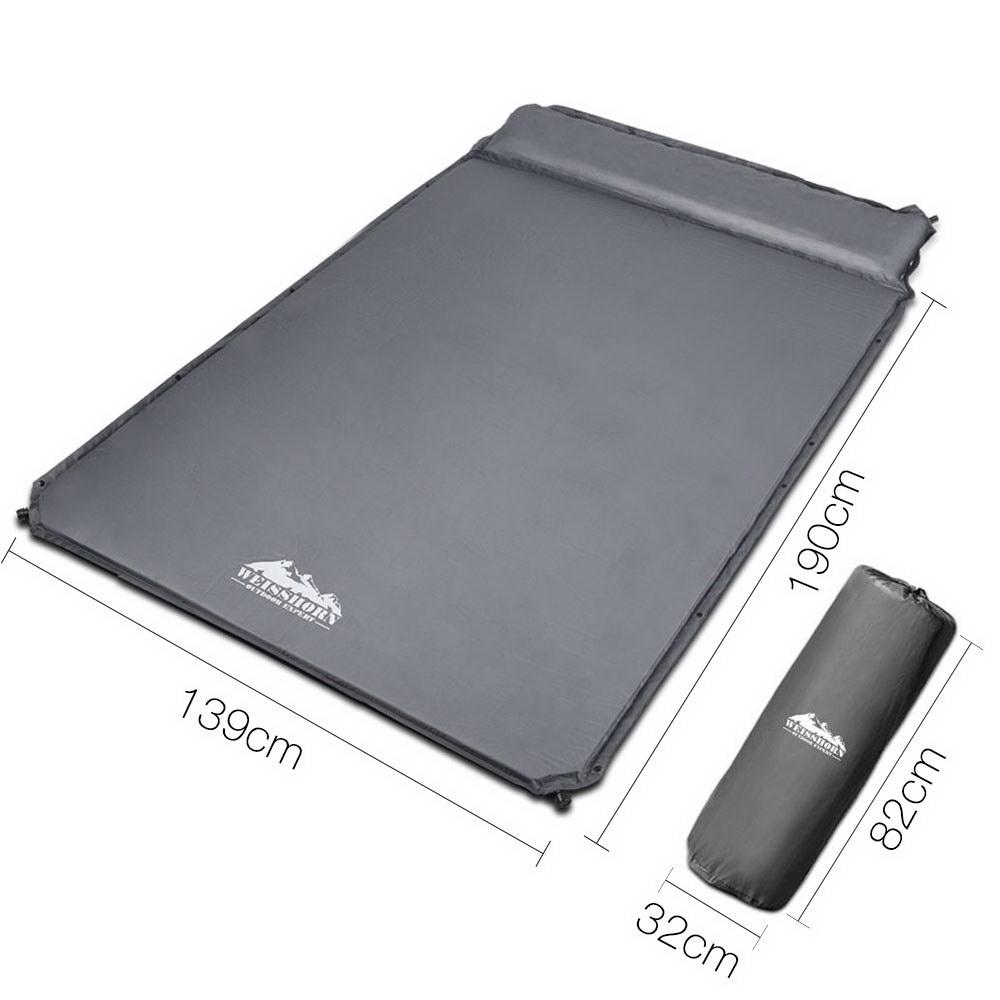 Weisshorn Self Inflating Mattress in grey color, showcasing its smooth surface and compact design, ideal for camping.