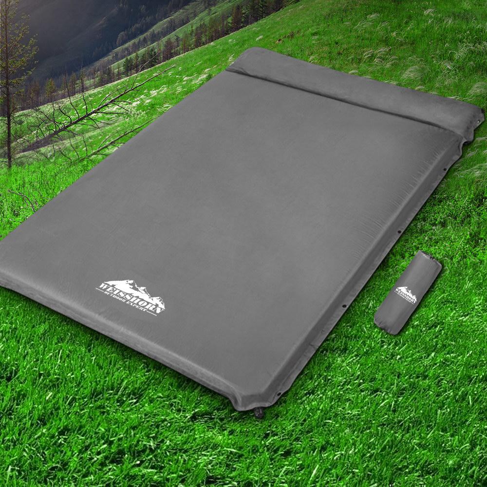 Weisshorn Self Inflating Mattress in grey color, showcasing its smooth surface and compact design, ideal for camping.