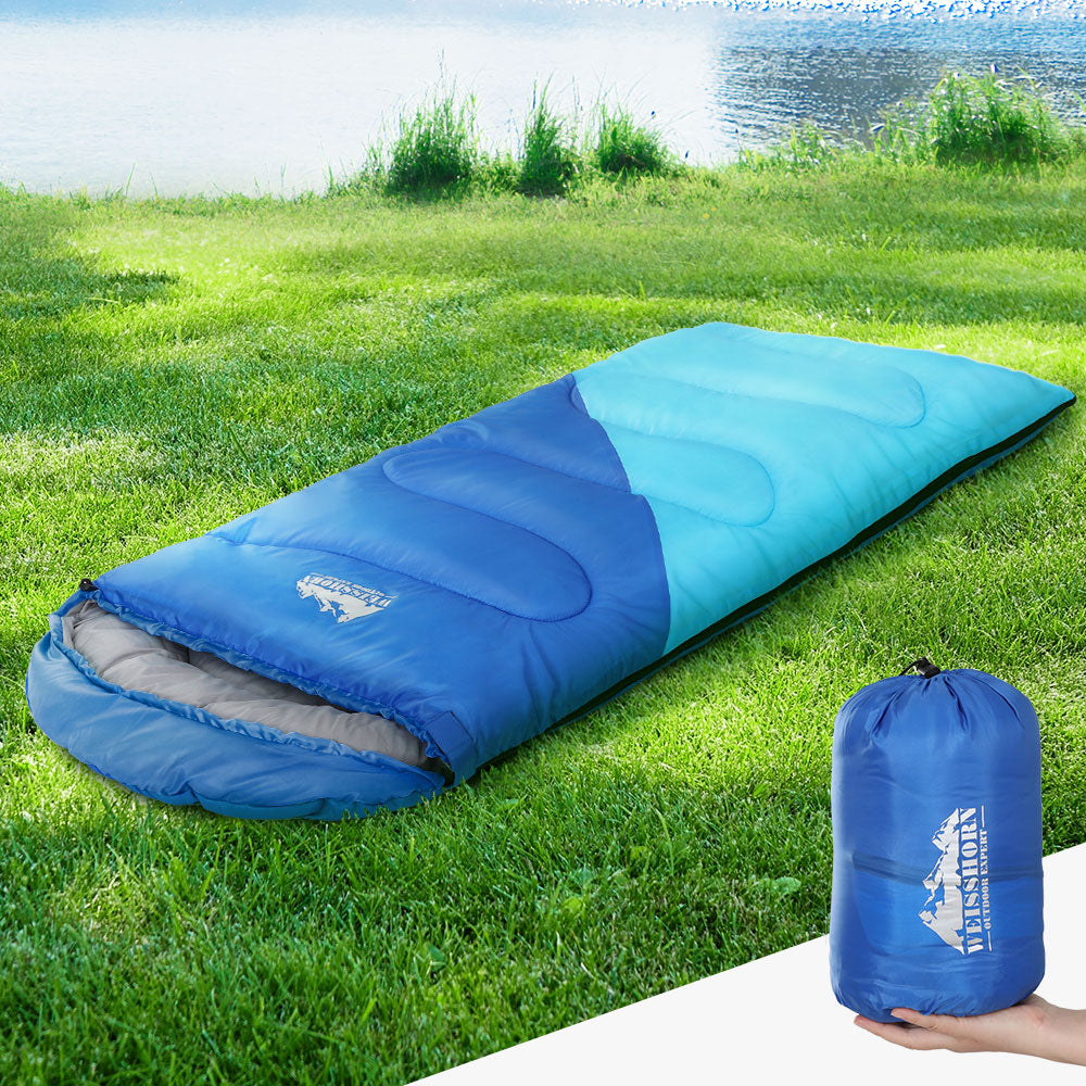 Weisshorn 136cm Kids Sleeping Bag in blue, featuring a colorful design and lightweight, water-resistant material, perfect for camping and hiking.