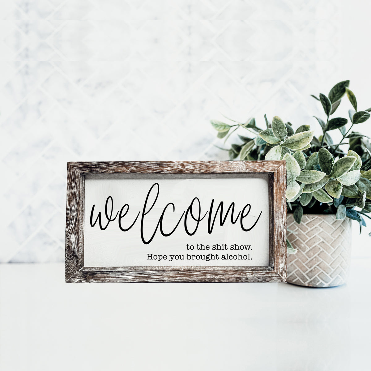 Humorous wooden sign reading 'Welcome to the Sh*t Show' with vibrant colors and a rustic frame, perfect for home decor.