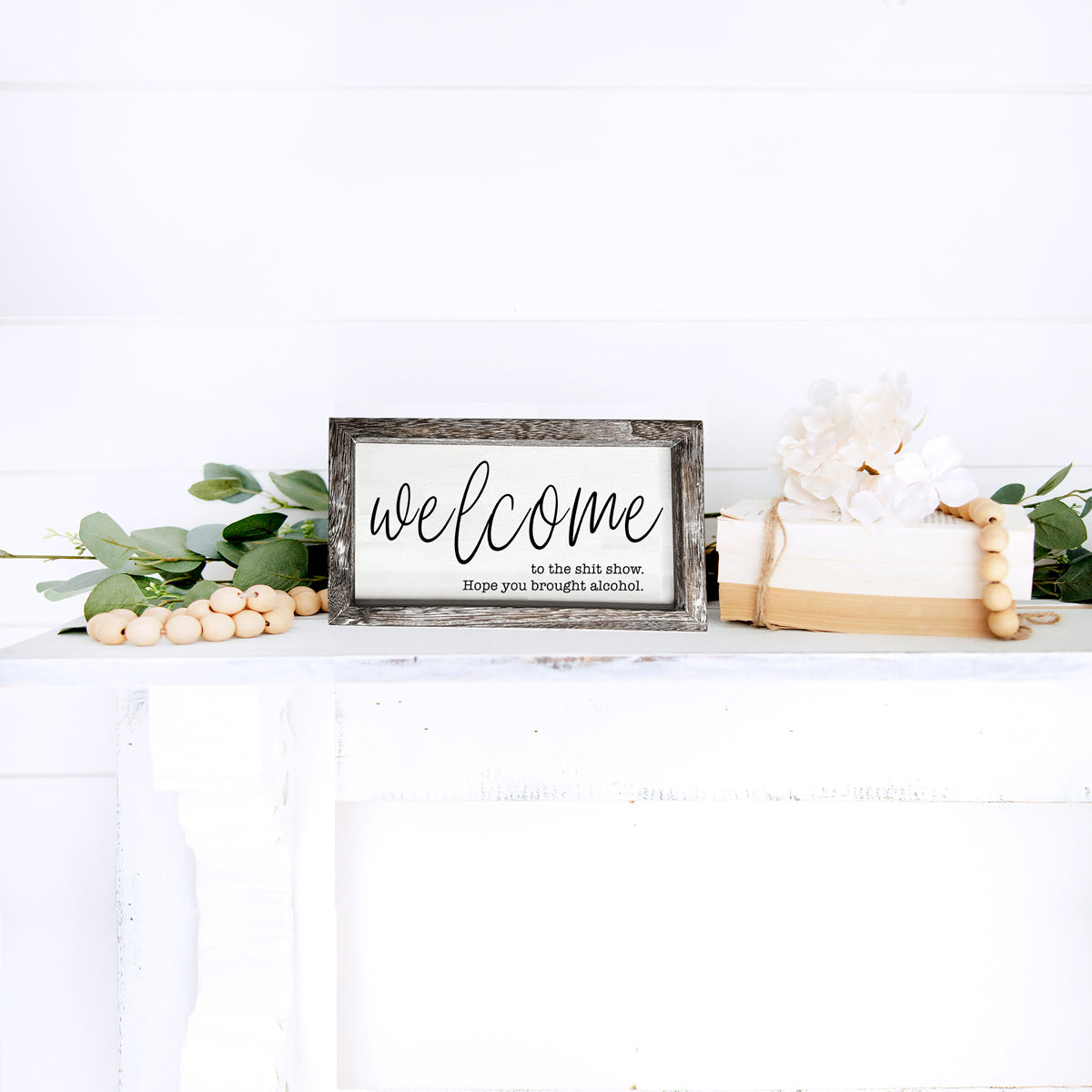 Humorous wooden sign reading 'Welcome to the Sh*t Show' with vibrant colors and a rustic frame, perfect for home decor.