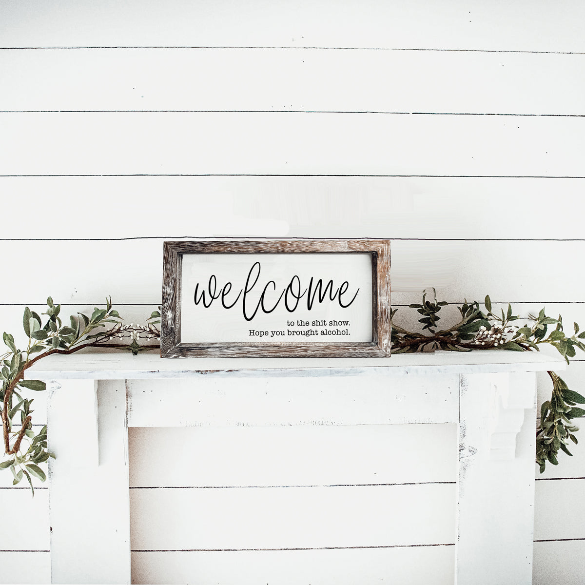 Humorous wooden sign reading 'Welcome to the Sh*t Show' with vibrant colors and a rustic frame, perfect for home decor.