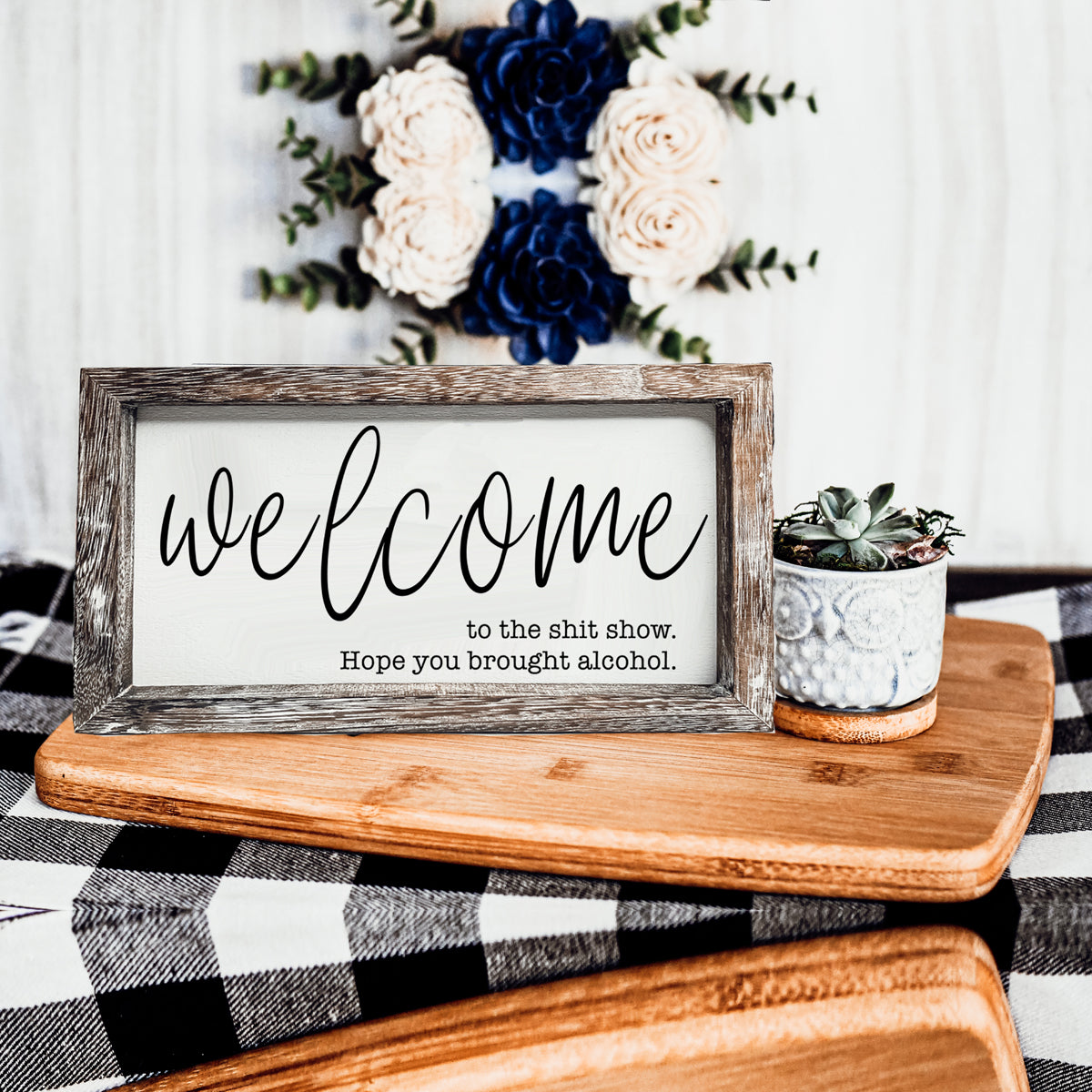 Humorous wooden sign reading 'Welcome to the Sh*t Show' with vibrant colors and a rustic frame, perfect for home decor.