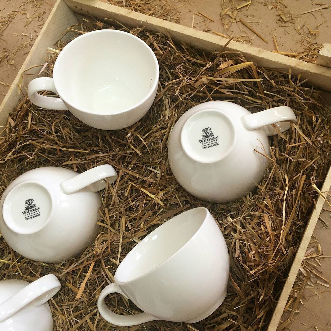 White porcelain coffee cup and saucer set, 3 oz capacity, elegantly designed for dining.