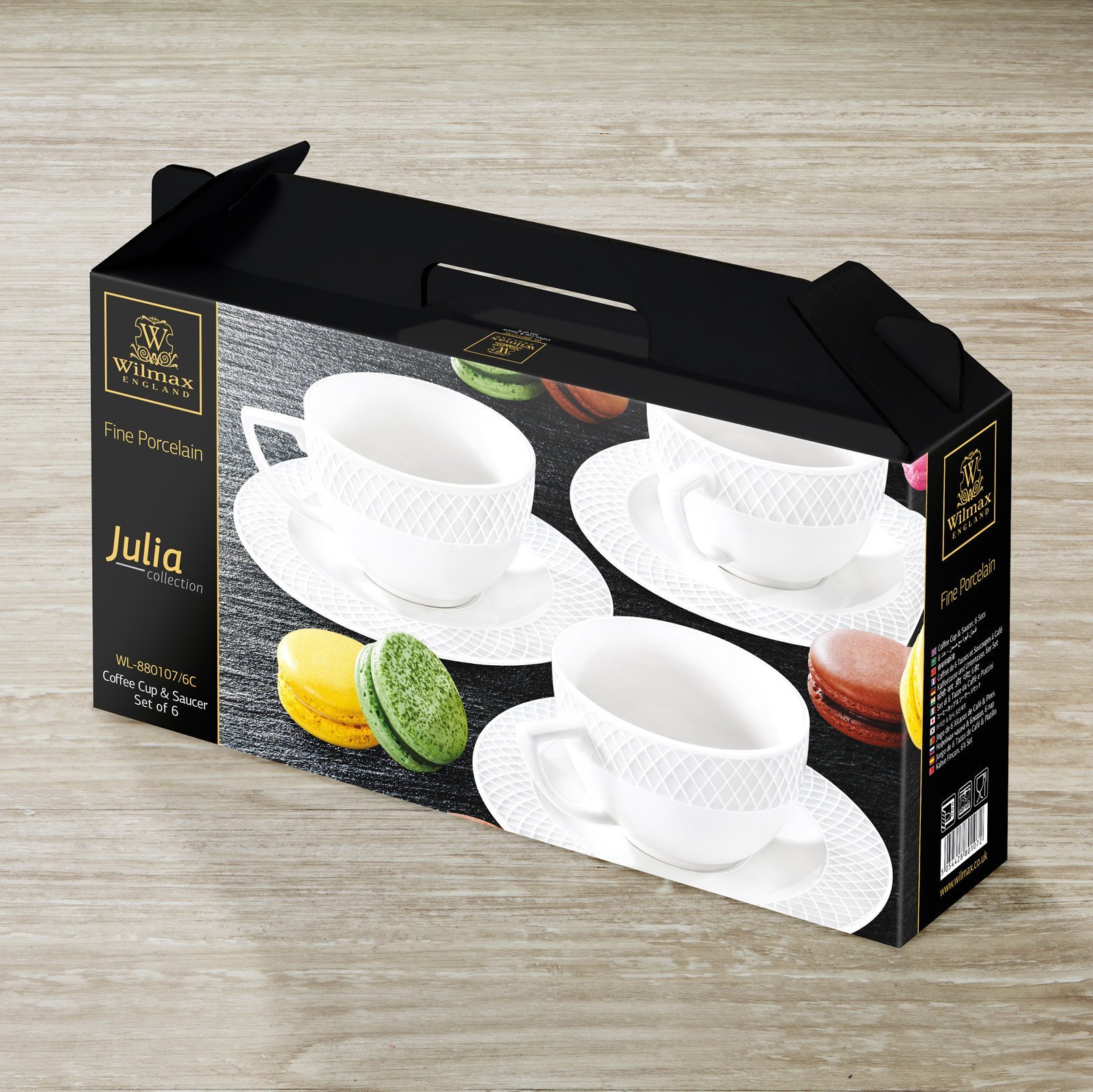 A set of six white porcelain coffee cups and saucers elegantly displayed in a gift box, showcasing their embossed design and rolled rim.