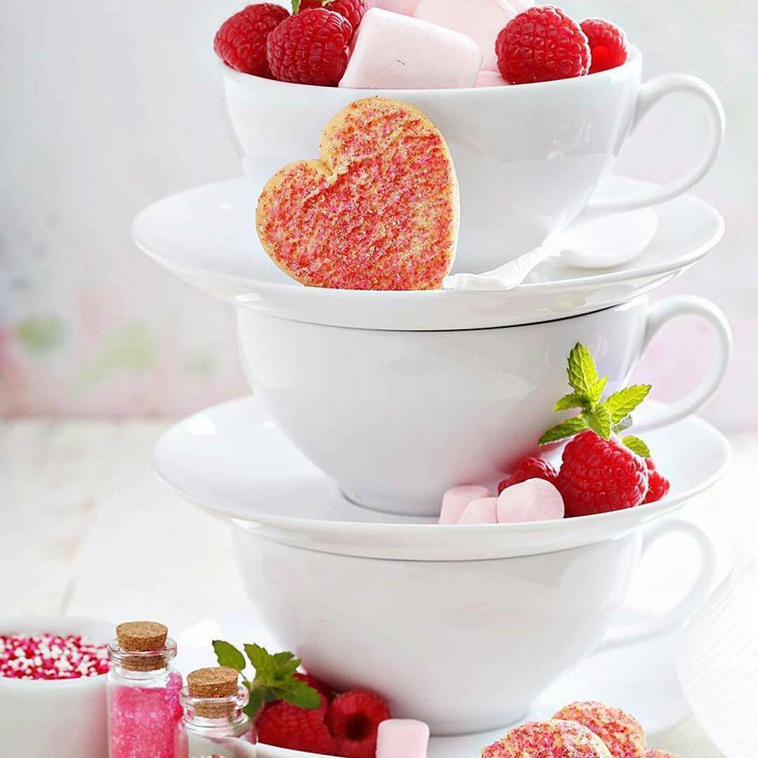 Elegant white 7 oz tea cup and saucer set made of fine porcelain, perfect for tea lovers and special occasions.