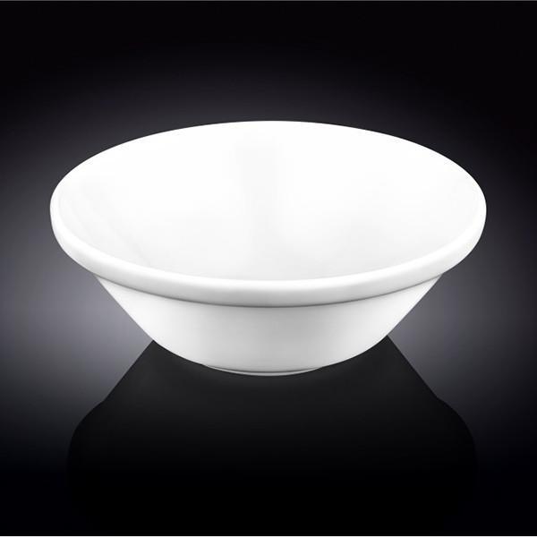 A 7-inch white porcelain bowl, perfect for serving soups, salads, and pasta, showcasing its classic round design and durable finish.